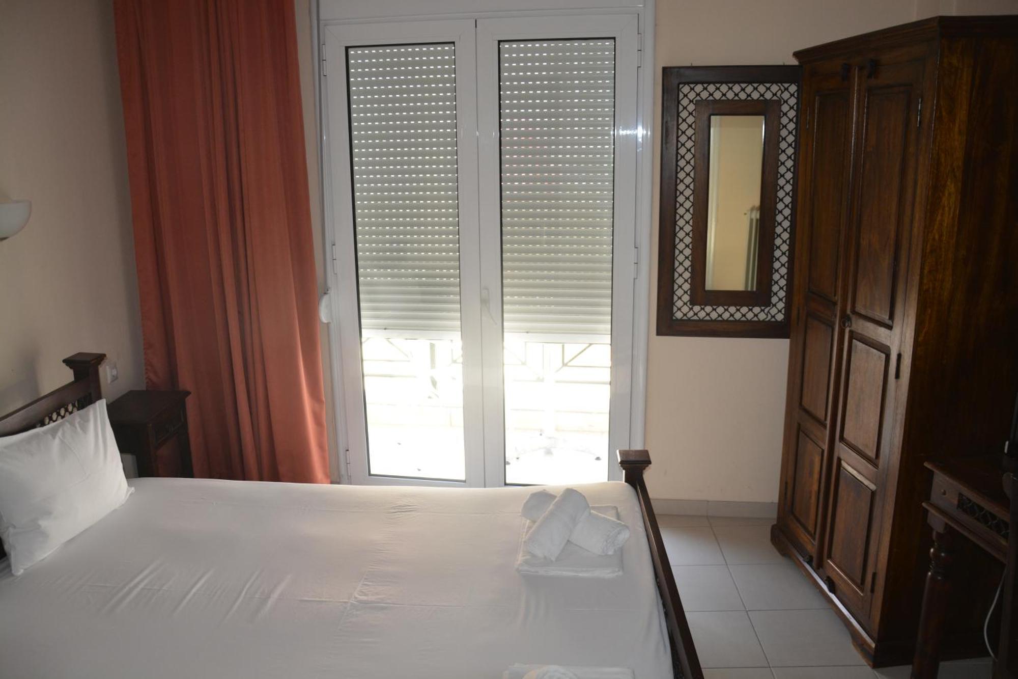 Dionyssos Hotel Limenas  Bagian luar foto