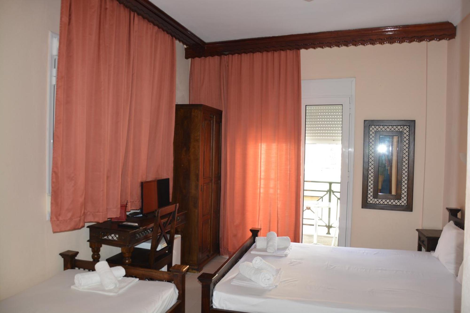 Dionyssos Hotel Limenas  Bagian luar foto