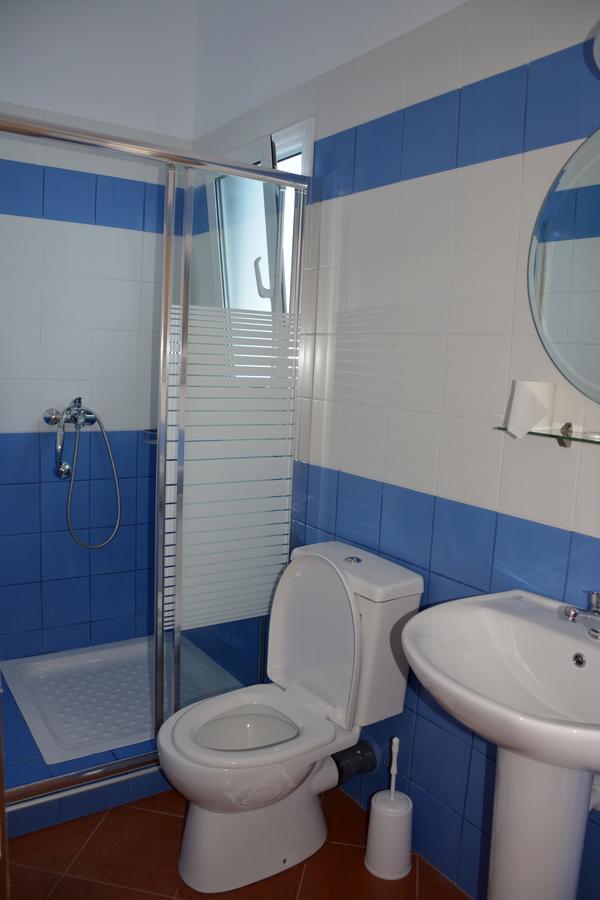 Dionyssos Hotel Limenas  Bagian luar foto